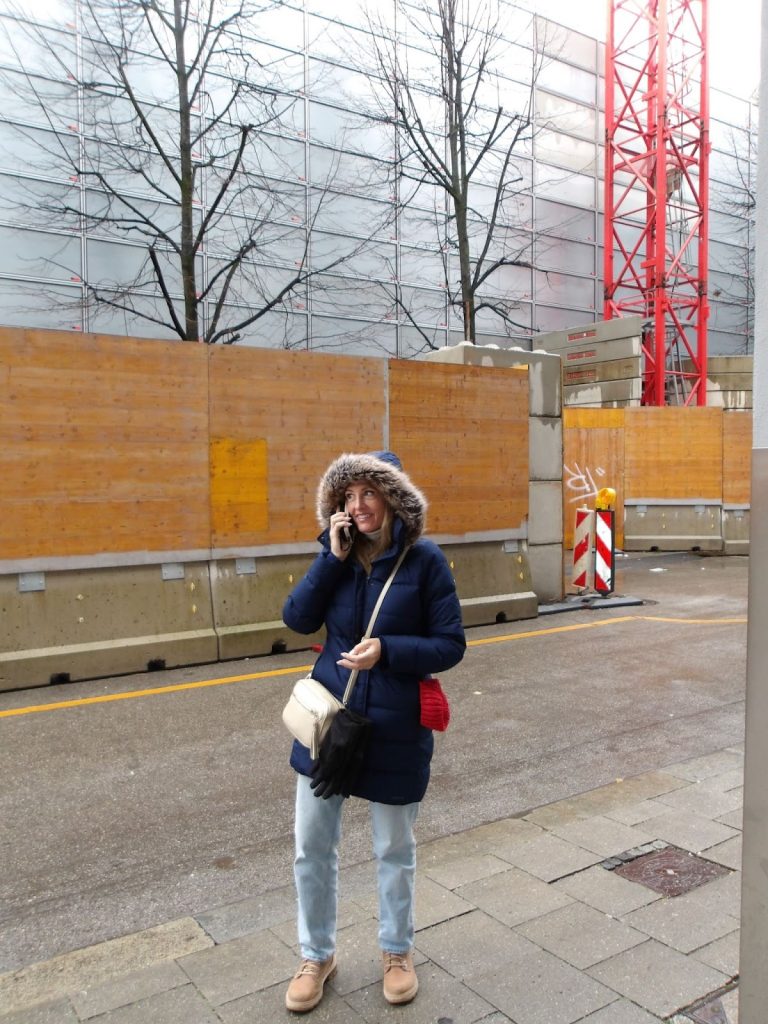 The author confirming with a vendor while leading a tour in Munich, December 2025
